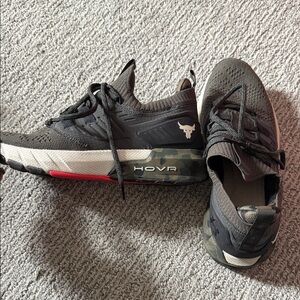 Under Armour Black and White HOVR Athletic Trainer with Red Accent